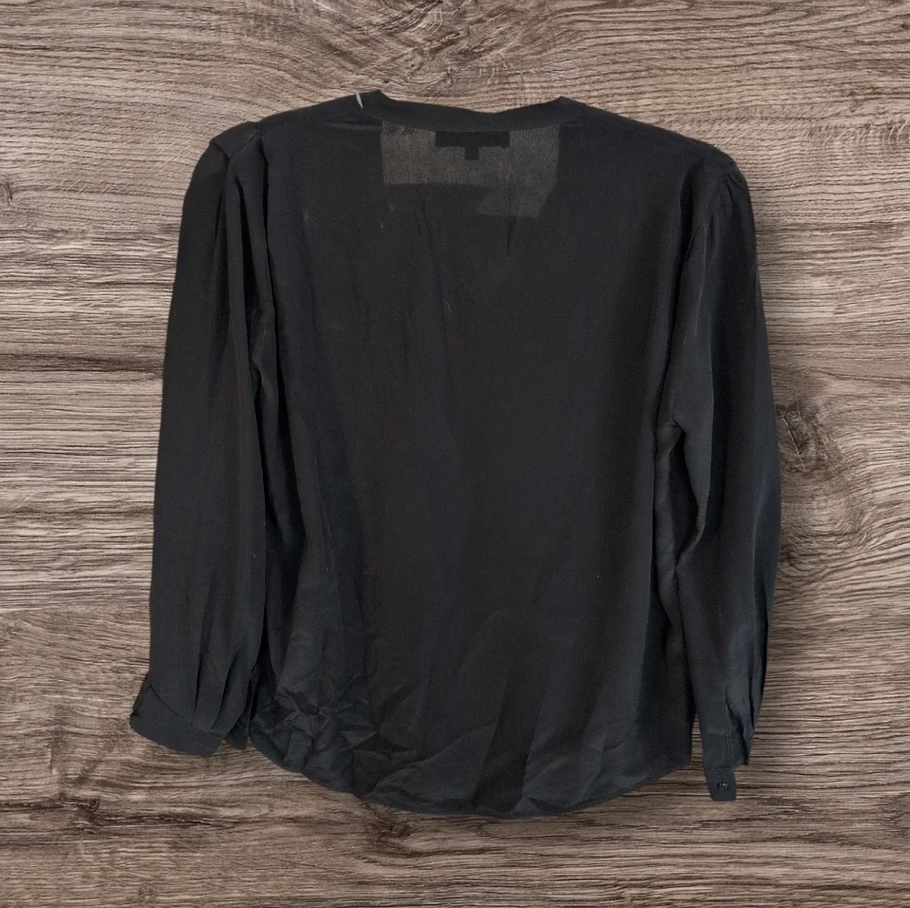 Sandro Paris black Silk blouse , pleated front and sleeves.